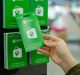 a hand holding xbox gift card